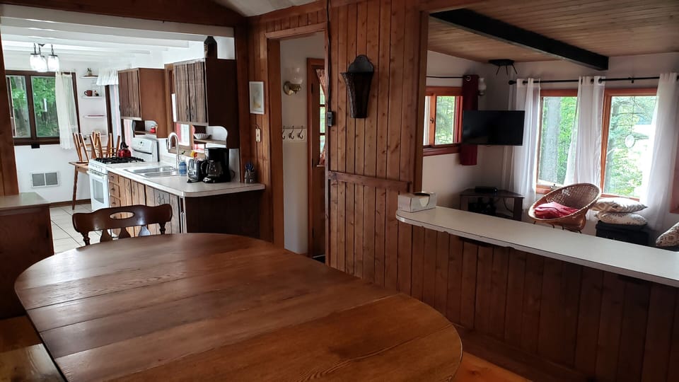 Dining/Kitchen - Open floor plan with kitchen/dining area.  Step down to the living room.  Step up to dining area