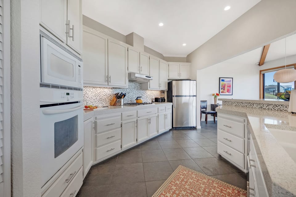 The kitchen is equipped with all the tools and gadgets you may need to whip up a fabulous meal.