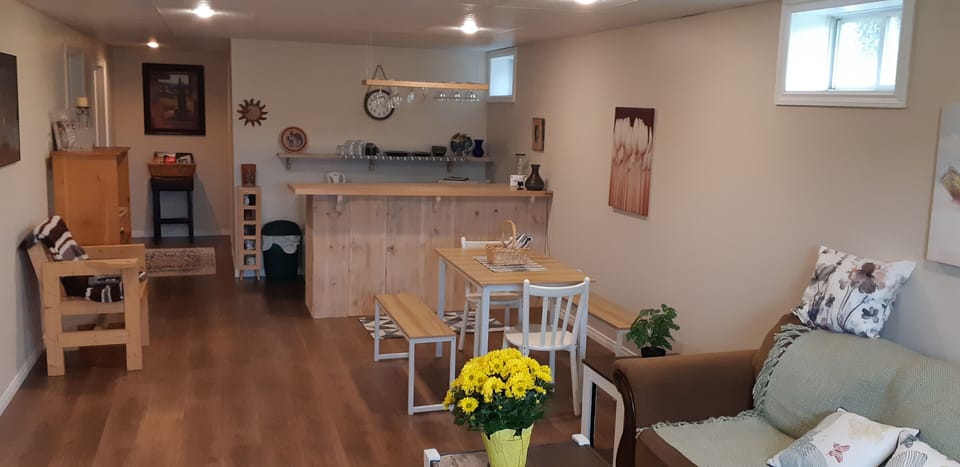 Compact kitchenette with kettle, min-fridge, coffee maker, microwave and toaster