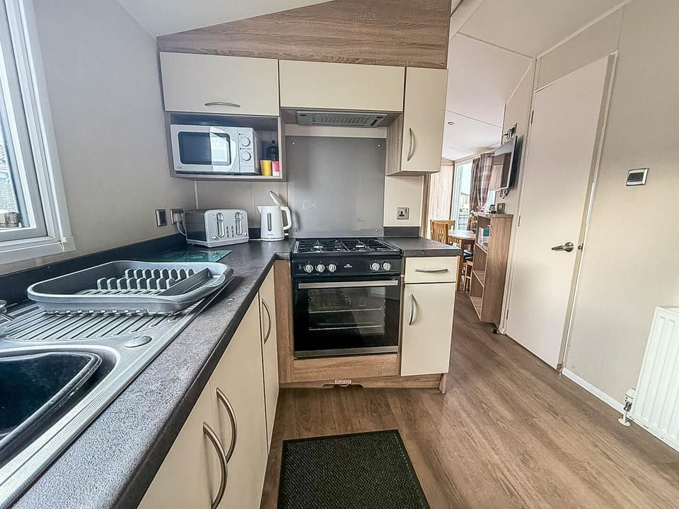 Book your holidays 2026 at Broadland Sands Holiday Park Lowestoft, where caravan holidays Suffolk offer stunning views of the Suffolk coast and a convenient kitchen area in a caravan.