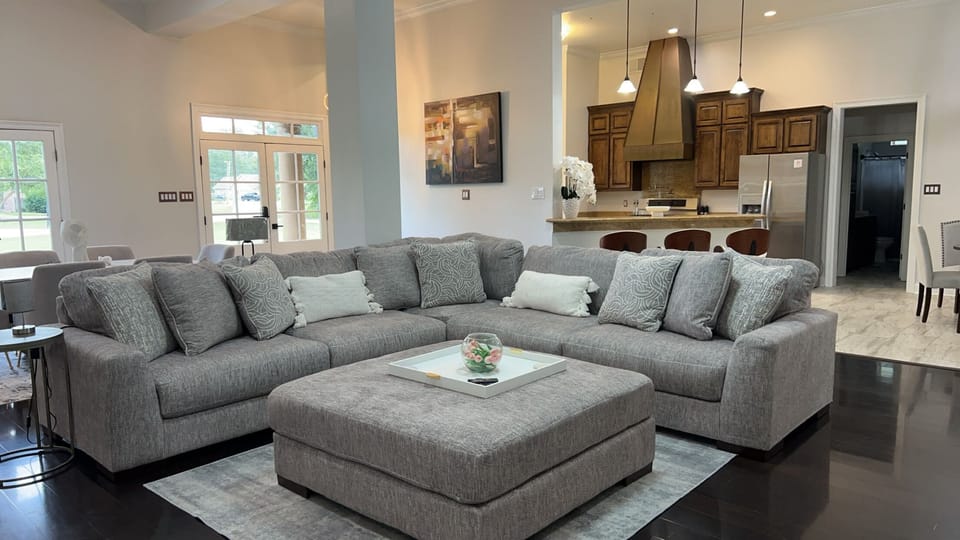 Amazingly comfy sofa with massive ottoman that turns into queen bed!