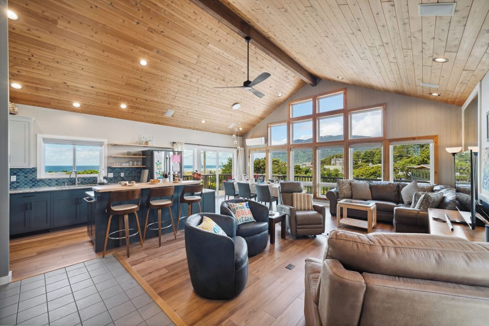 Open living space with newly remodeled kitchen, living room with Smart TV, streaming only, dining room. All with ocean views. Access to deck with outdoor seating and Gas BBQ.