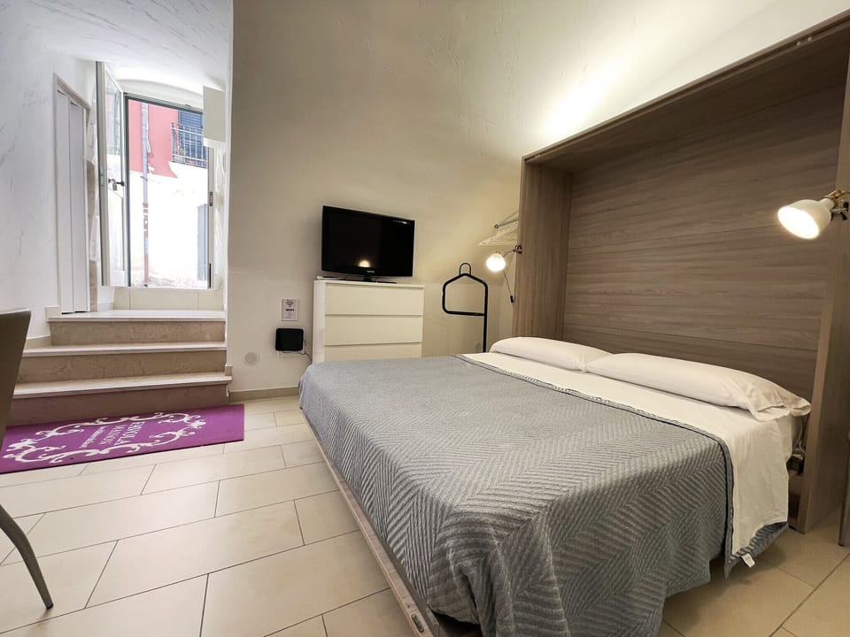 Bedroom apartment Maison Favola - Affitti Brevi Italia