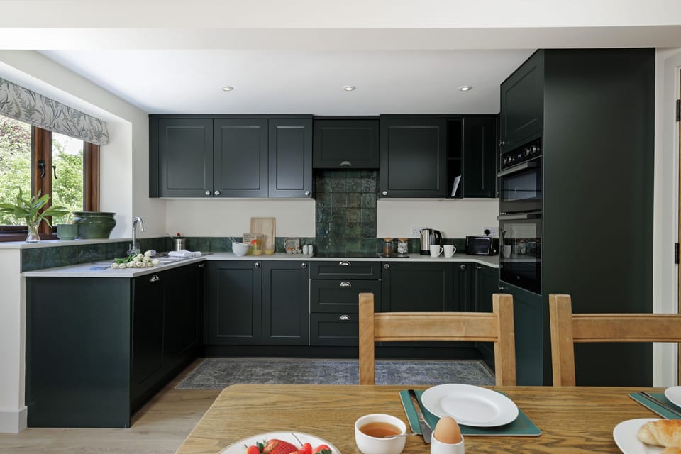 Well-equipped kitchen with an electric oven and induction hob