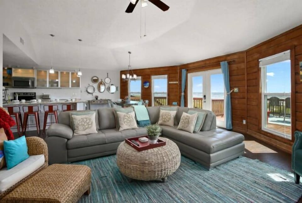 This home is beachfront!!!  Yes, first row, beachfront!  Enjoy the view, and the sound of waves rolling in.