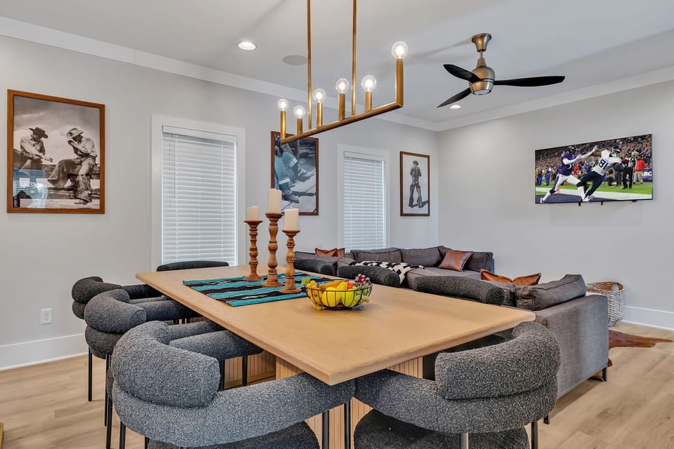2nd Floor: Formal dining table between the living room and kitchen offering a large table to accommodate 8 guests.