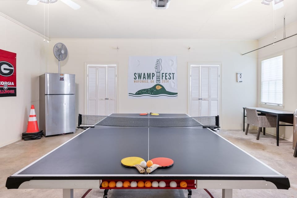 Pong and darts in the garage.