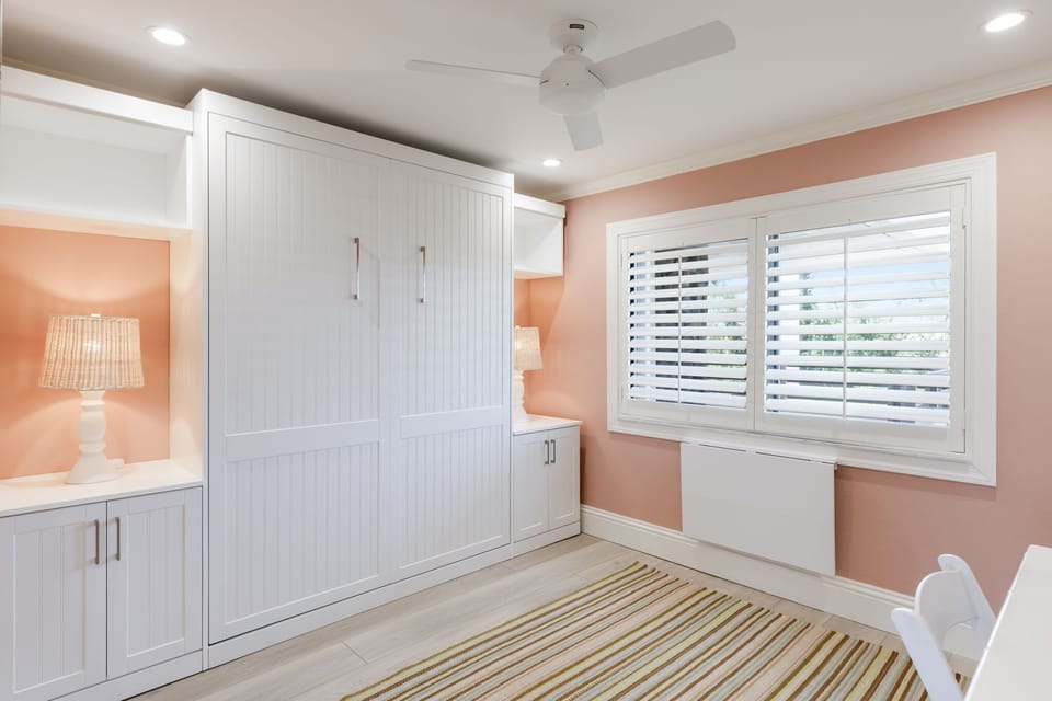 Guest bedroom 2 with queen Murphy bed and fold up desk