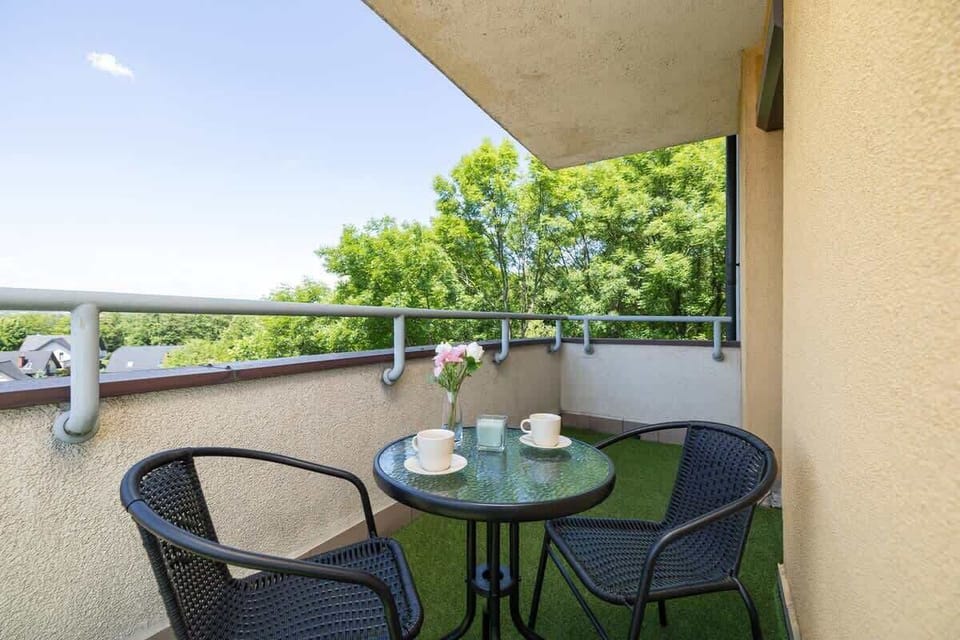 Balcony with dining area.