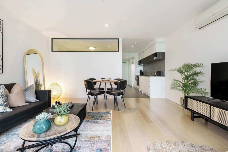 DINING: A cosy space with seating for four, perfect for casual meals and relaxed conversation.
