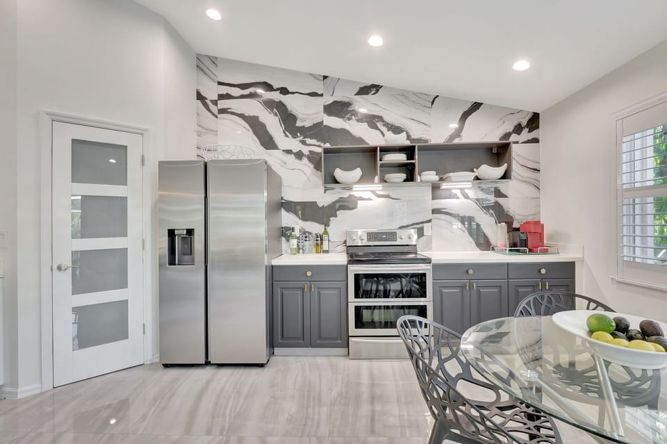 The Backsplash in the Kitchen Creates a Warm and Inviting Accent
