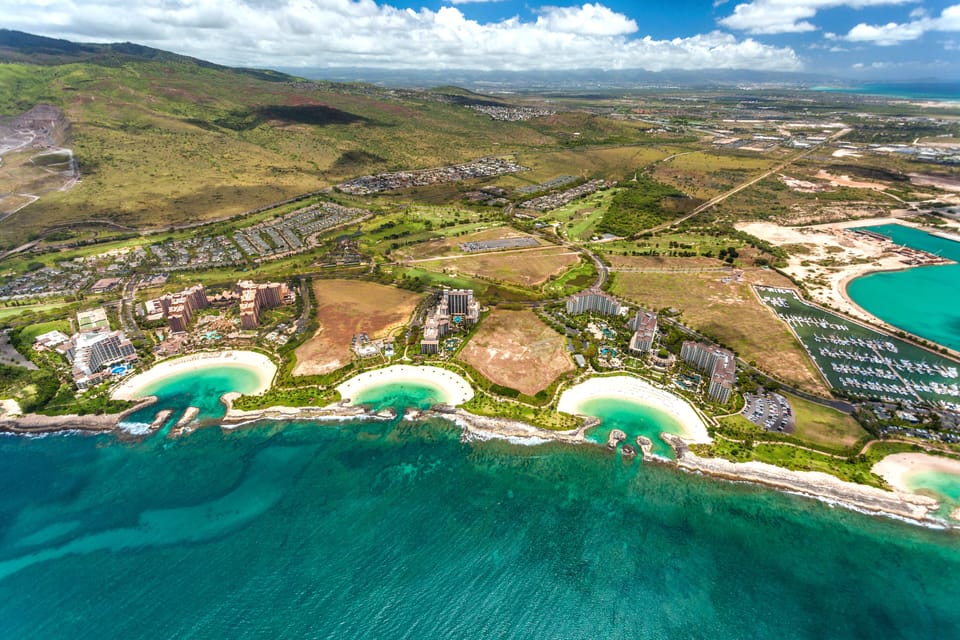 Breathtaking aerial view of Ko Olina’s lagoons and resort community, your tropical playground.