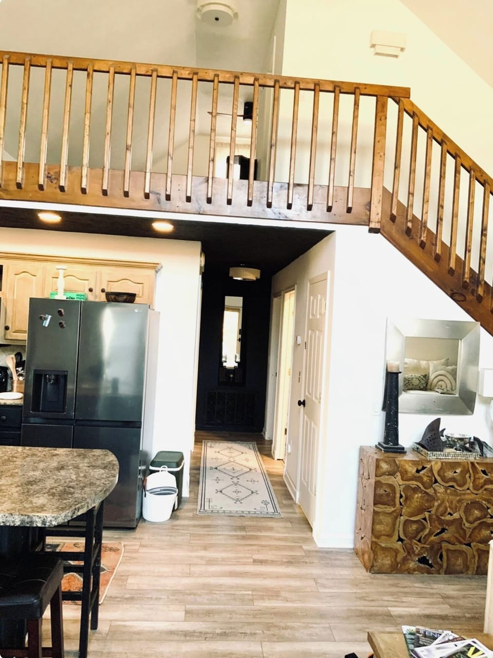 HALLWAY TO MAIN FLOOR BEDROOMS / VEIW OF UPSTAIRS LOFT BEDROOM AREA