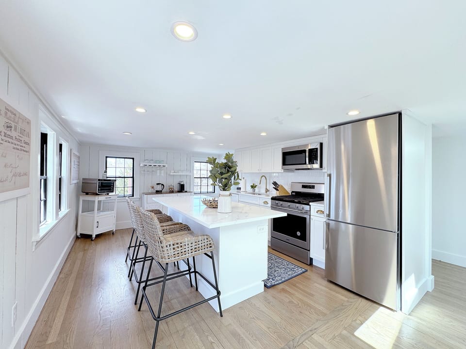 Stainless kitchen with Nespresso Machine.