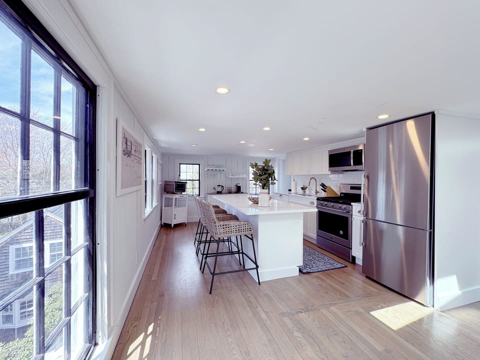 Stainless kitchen with Nespresso Machine.