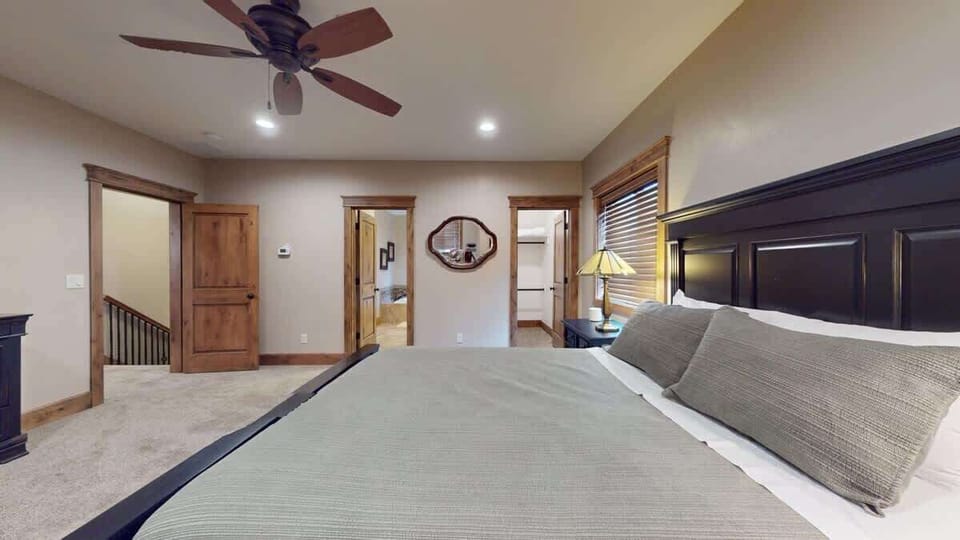 Upstairs master bedroom with walk in closet and ensuite bathroom.