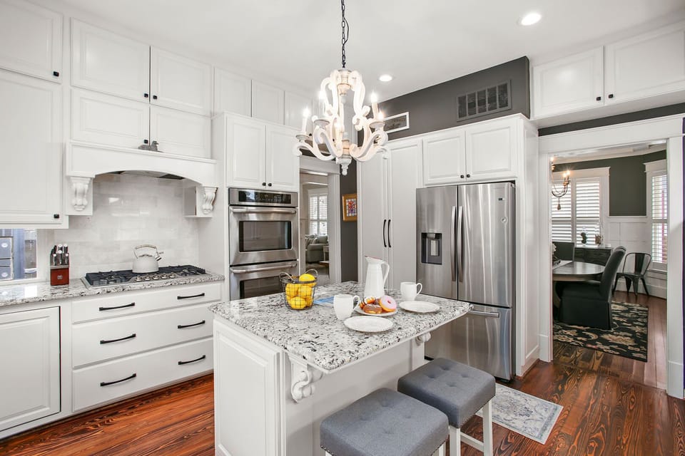Nice big kitchen stocked with pots, pans, dishes, and utensils needed to prepare a nice meal. Bring your favorite food and drinks!  Kitchen looking into dining area.