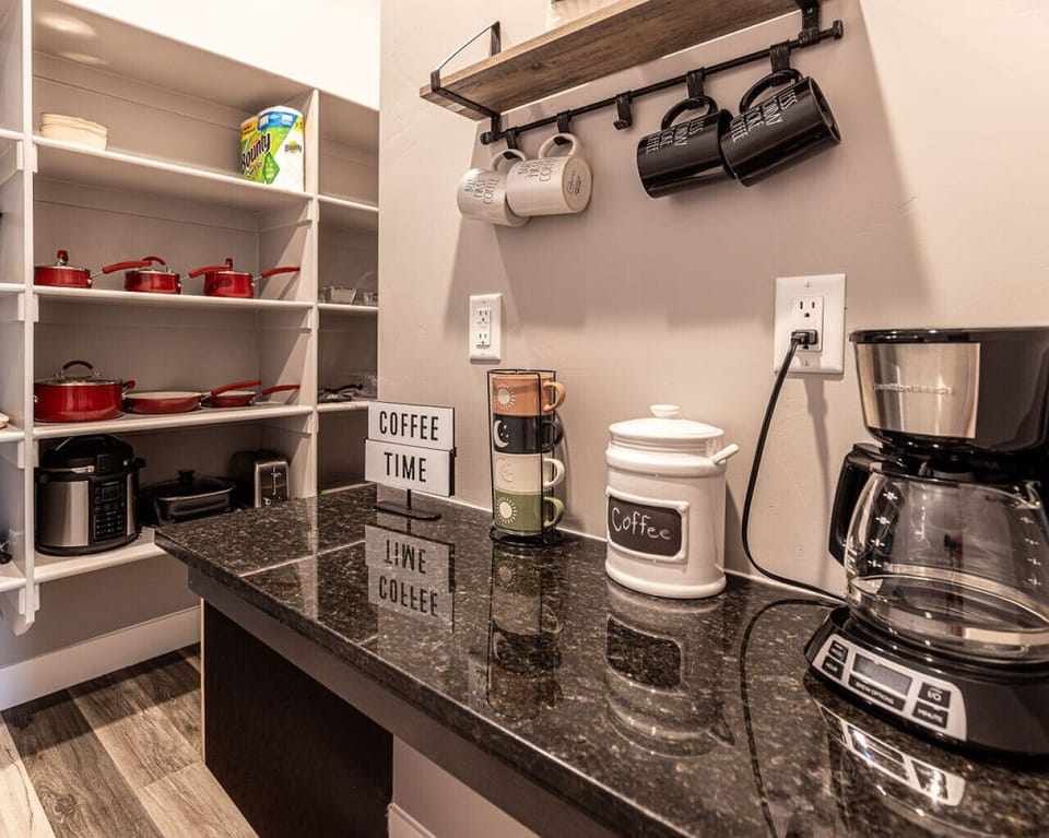 Our fully stocked kitchen and pantry offers coffee, filters, spices, condiments, oil, paper products and everything you need to cook a meal for the family.