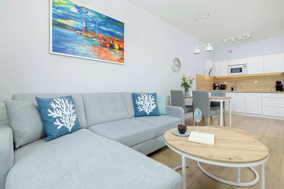 Living room with a comfortable sofa and TV. 