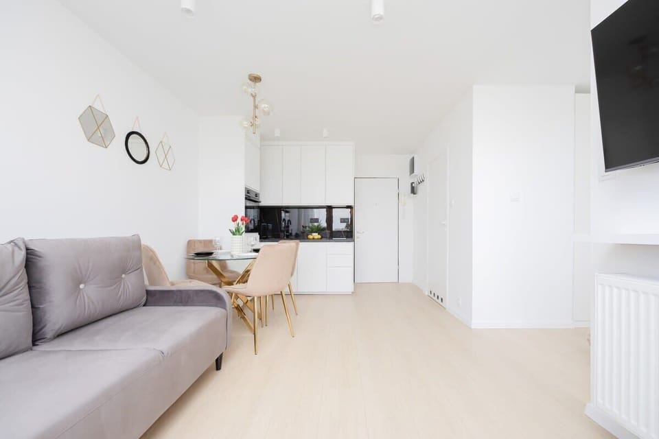 Living area with dining table for 4 people.