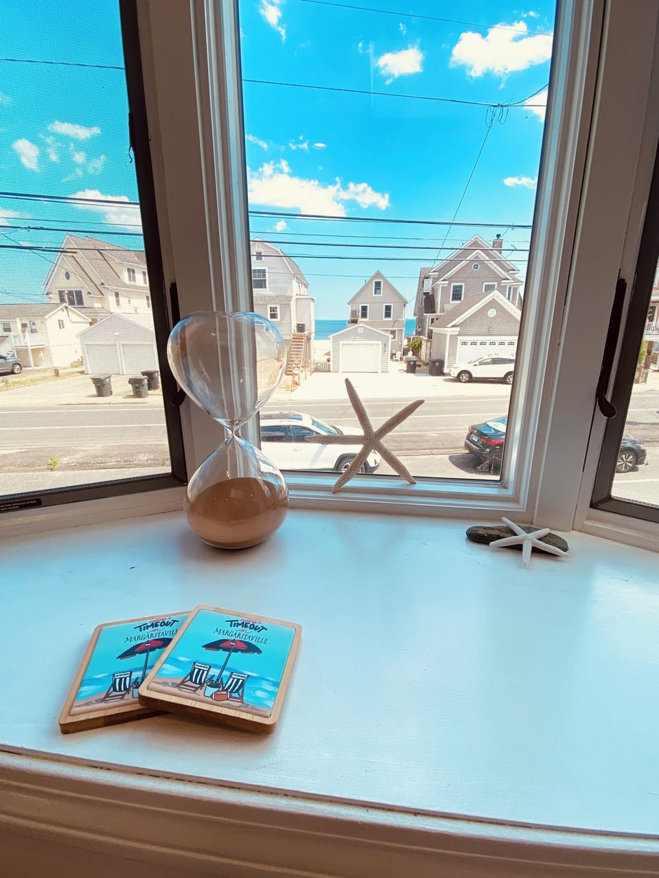 view from front window, private beach can walk or sit below high tide line.
