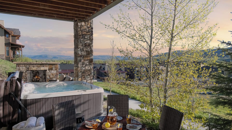 Hot Tub, Main Level - Covered hot tub with mountain and valley views