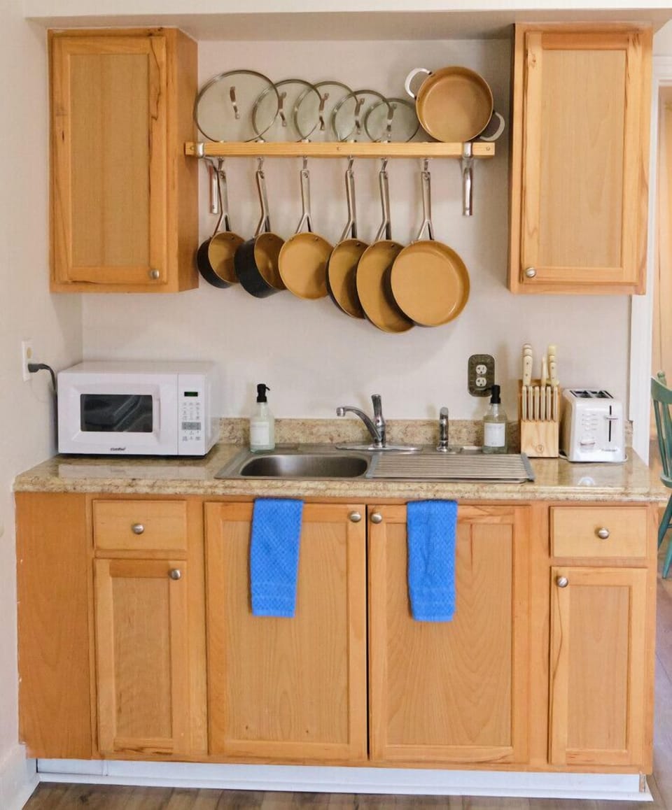 Microwave, toaster, oven, stovetop, coffee maker, refrigerator