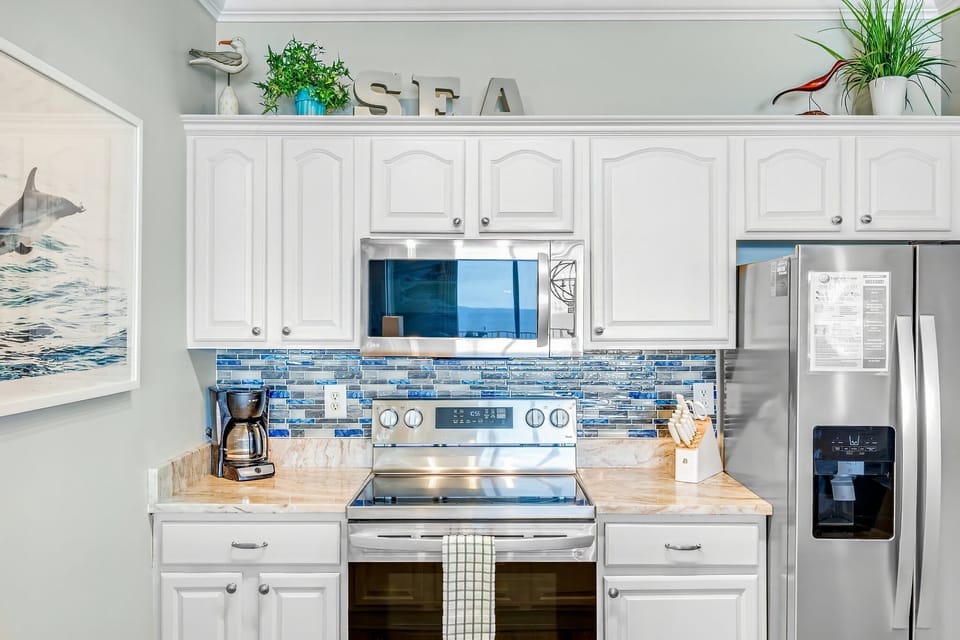 The fully equipped kitchen features granite countertops and stainless-steel appliances and has everything you need to prepare meals for family & friends.