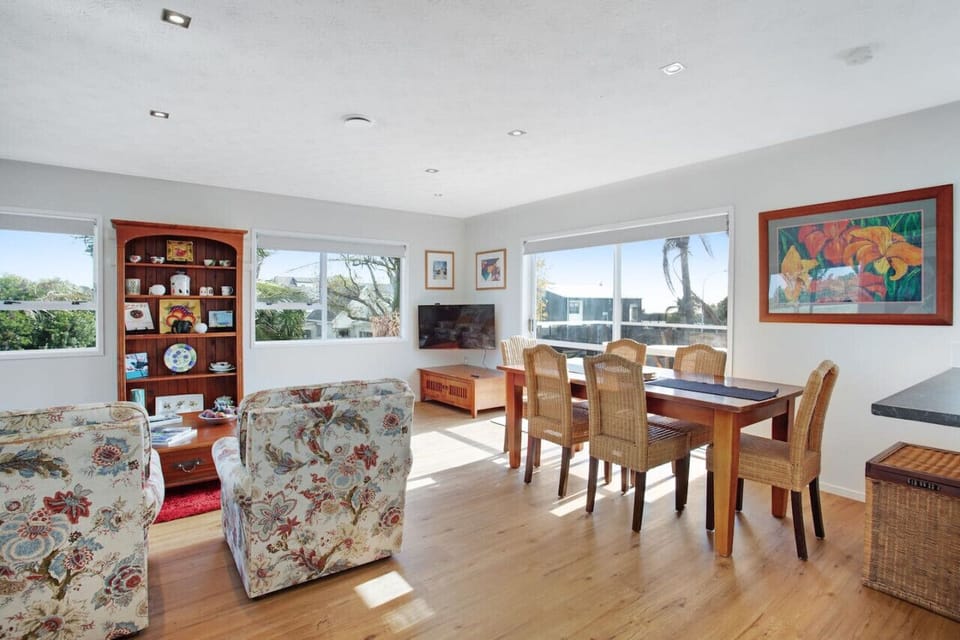 The dining table is part of the open plan living spaces.