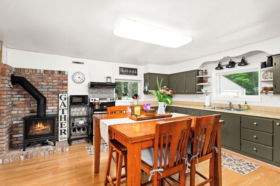 Main cabin kitchen with cozy gas fireplace