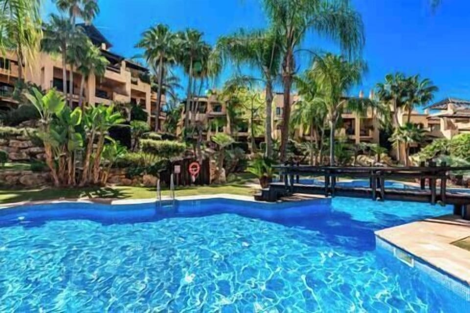 This beautiful urbanization has a splendid swimming pool in a fresh, green garden. (1)