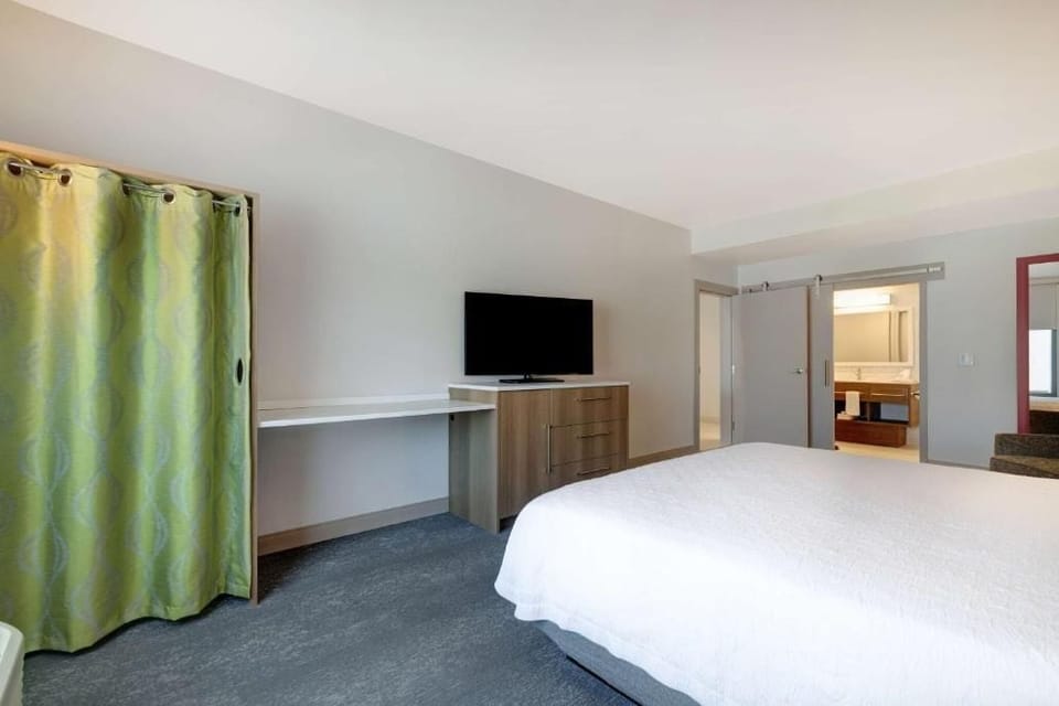 Settle in with a roomy workspace and easy TV viewing.