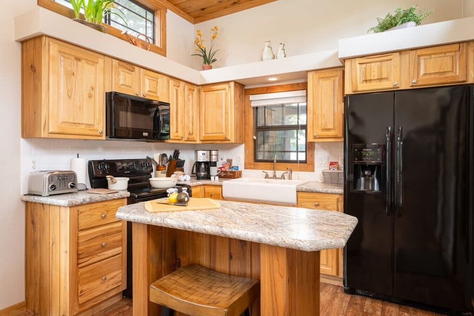 Kitchen island and cooking utensils & dishes included