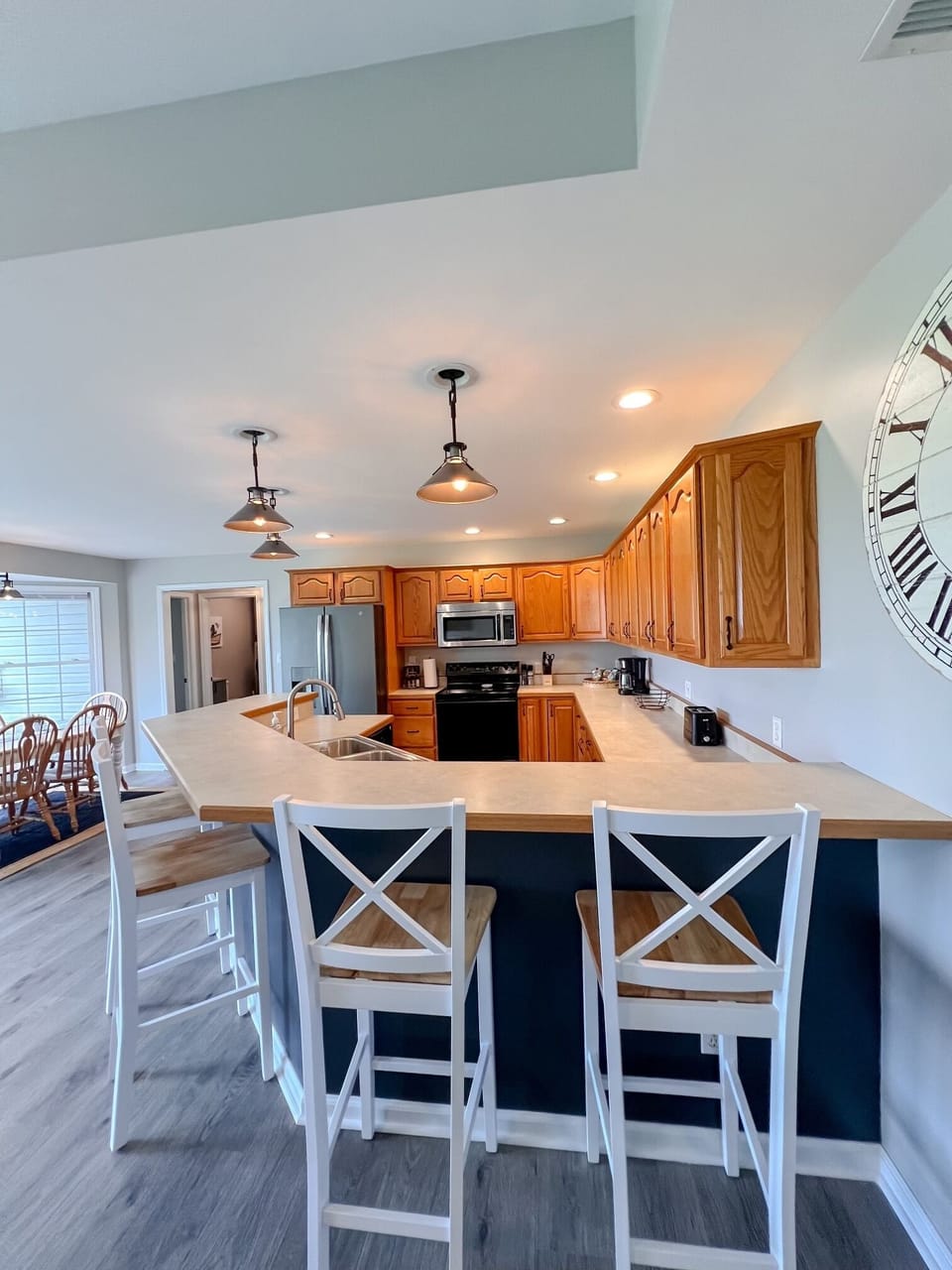 Seating for 6 with bar stools.