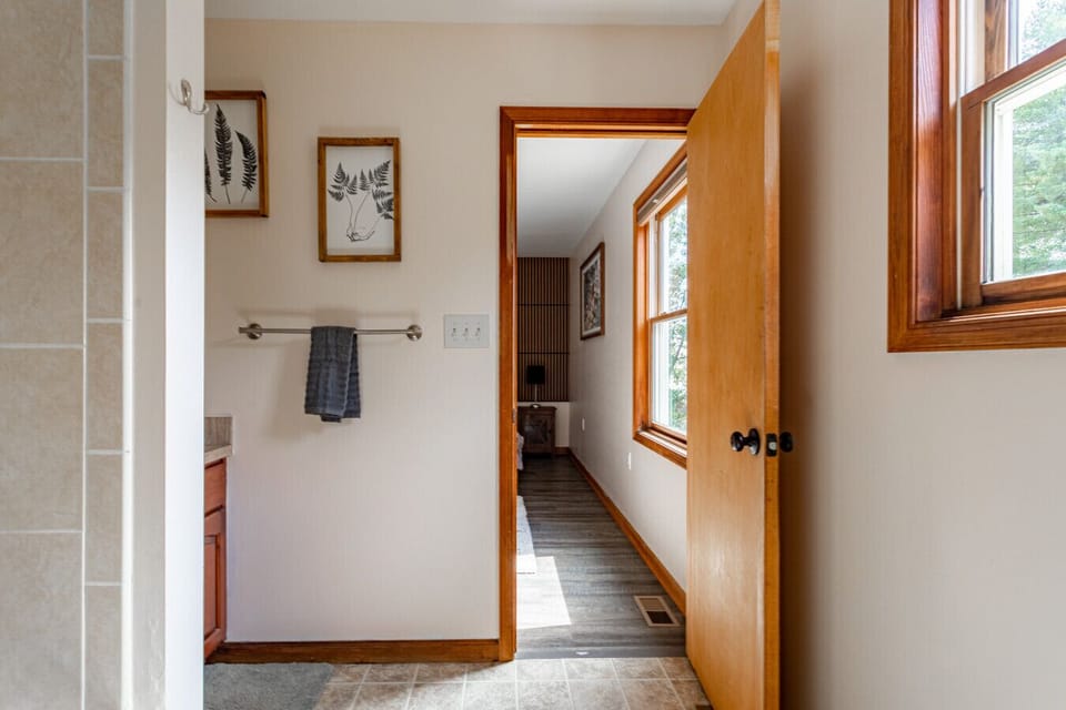 “Convenient bathroom layout with modern fixtures and direct access from the bedroom.