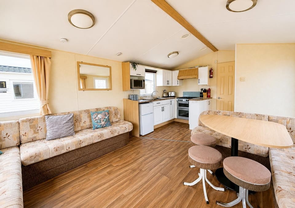 Enjoy relaxing in a comfortable bedroom in a caravan at Heacham Beach Holiday Park after a day exploring the Hunstanton Sea Life Sanctuary Norfolk or catching a show at the Princess Theatre Hunstanton.