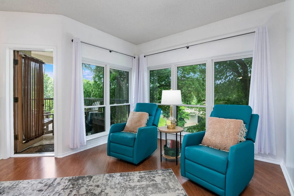Rocking chairs with Comal River views