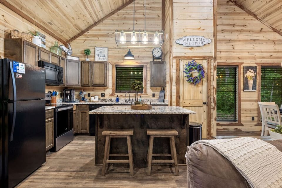 `Kitchen has everything we needed to cook with like we were home. Bed was super comfortable. Wifi worked great so I could work remotely for a few days.` - Liz
