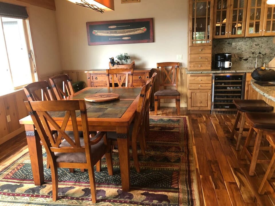 Dining table next to kitchen