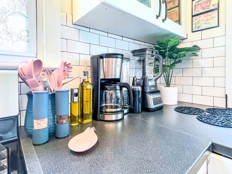 Ninja coffee maker, blender, grinder, and all the essentials to cook up whatever your heart desires.