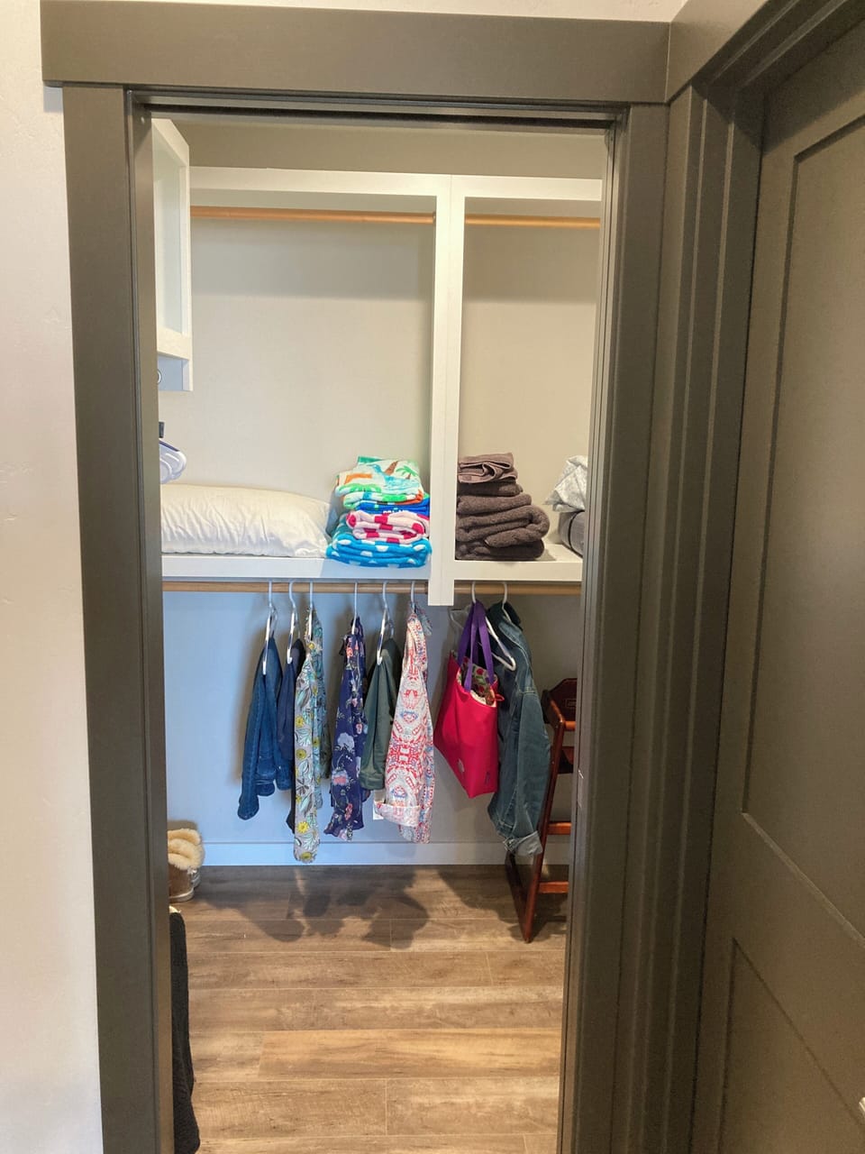 Walk-in closet in master bedroom.