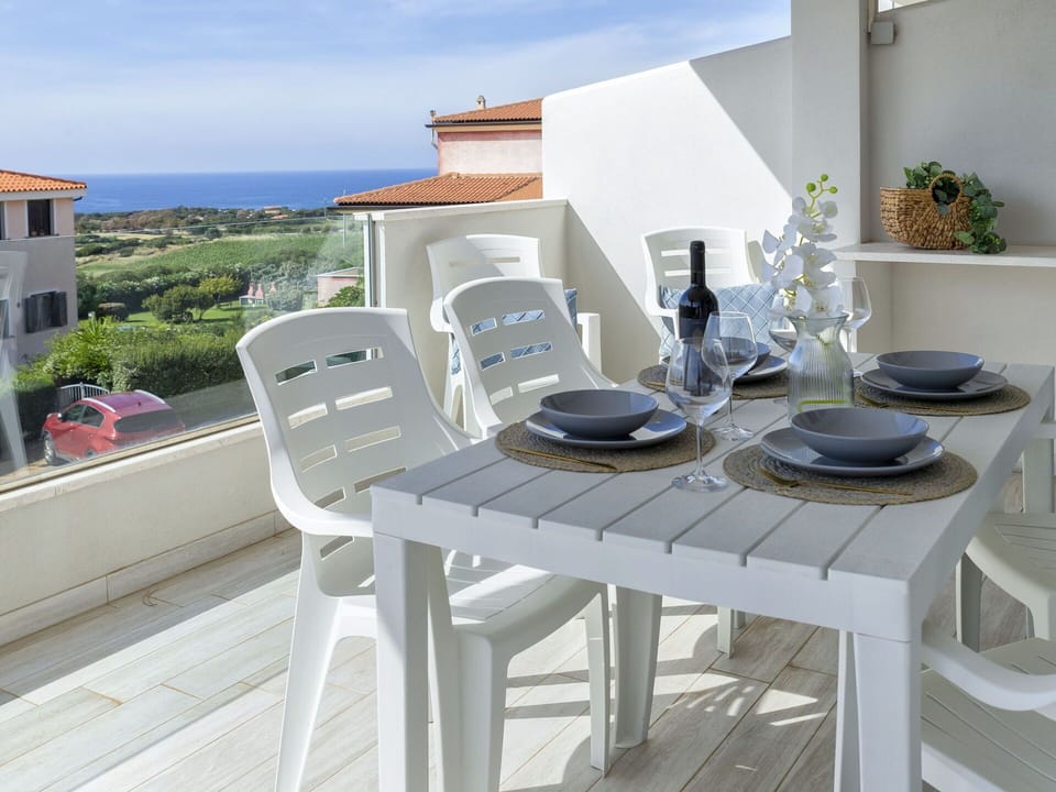 Sky, Table, Plant, Tableware, Building, Cloud, Outdoor Furniture, Outdoor Table, Interior Design, Wood