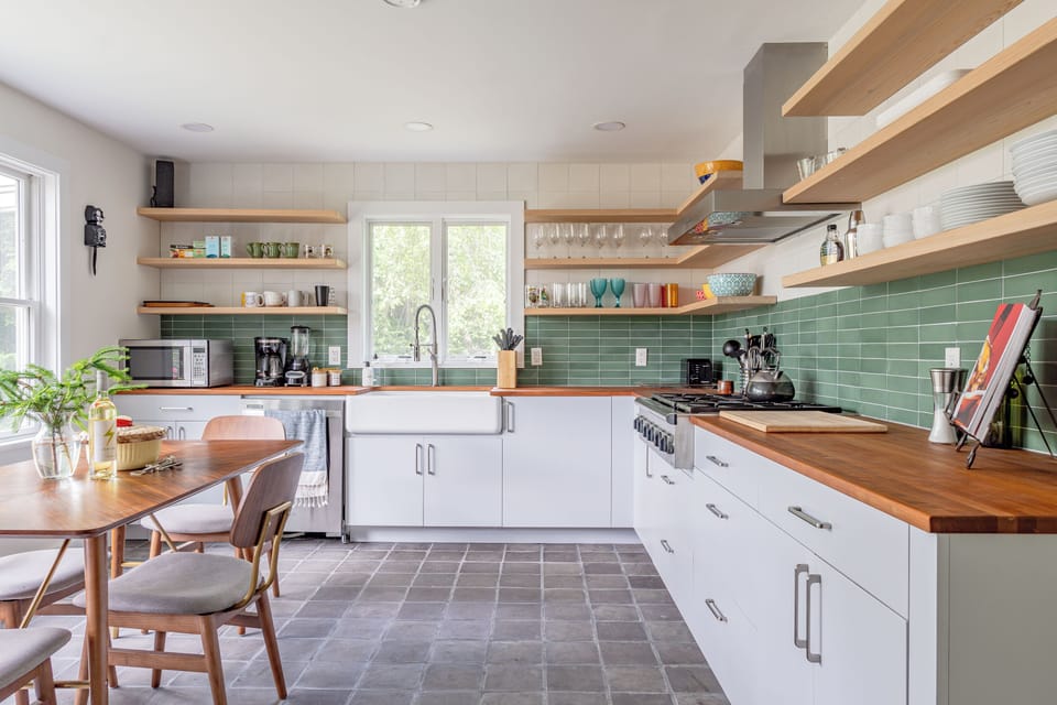 The spacious kitchen with dining table for four. 