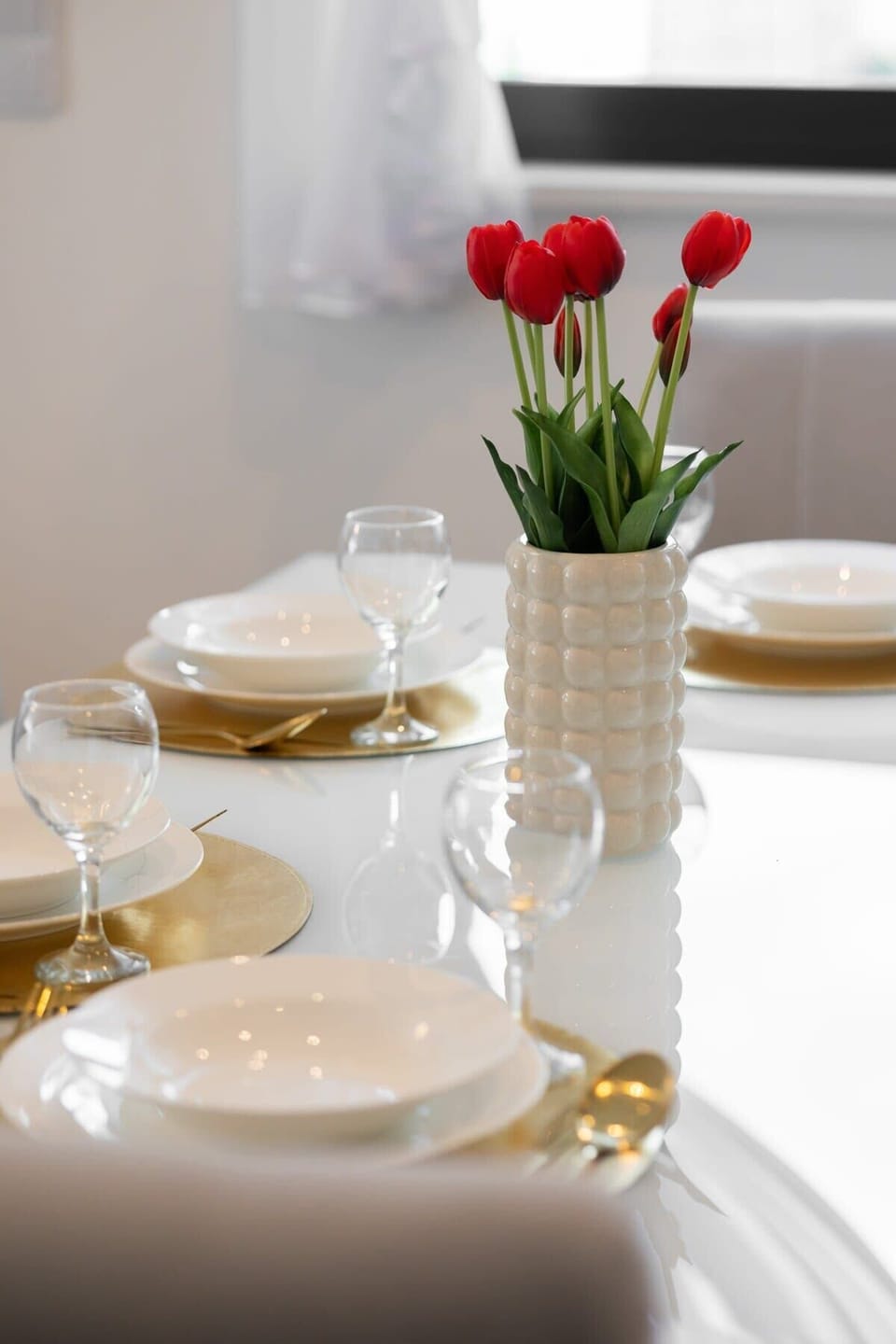 Large table with chairs for eating communal meals. 