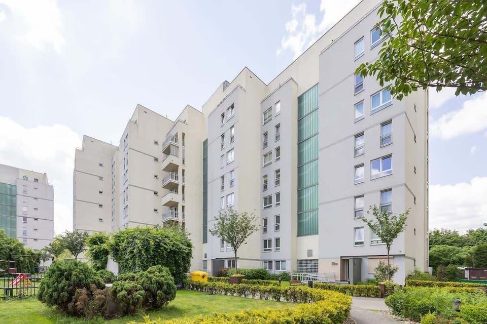 Greenery around the building. 