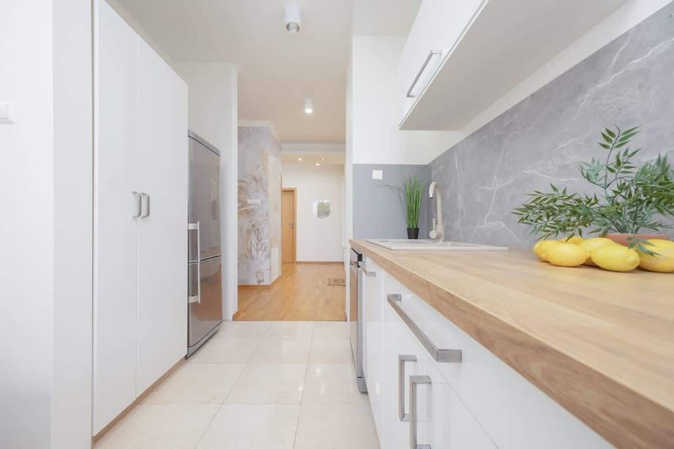 Bright kitchen with cooking utensils.