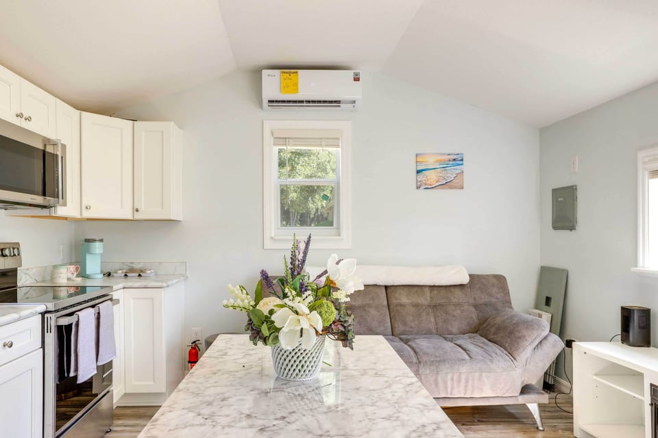 Living Area | Full Futon | Electric Fireplace | Smart TV