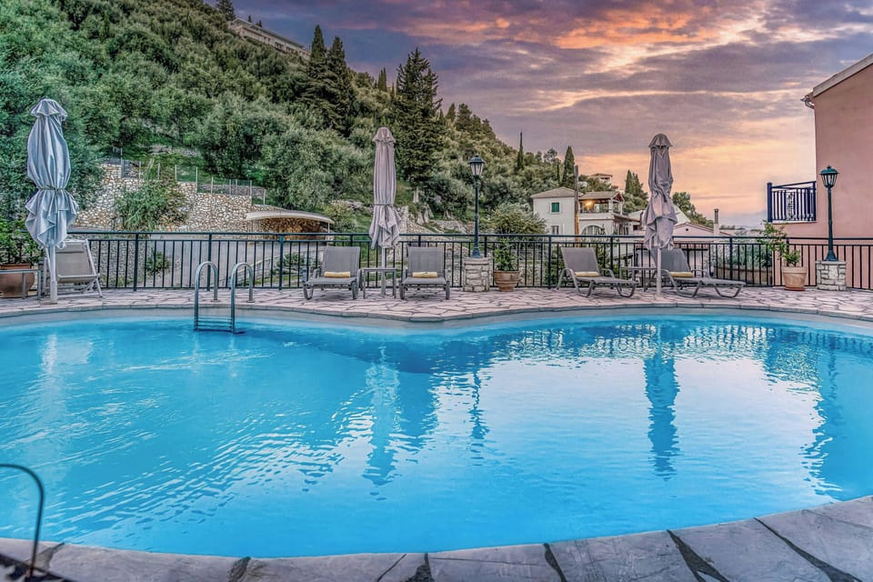Poolside Serenity: Lounge by the pool while soaking in the peaceful ambiance of Kaminaki Village.
