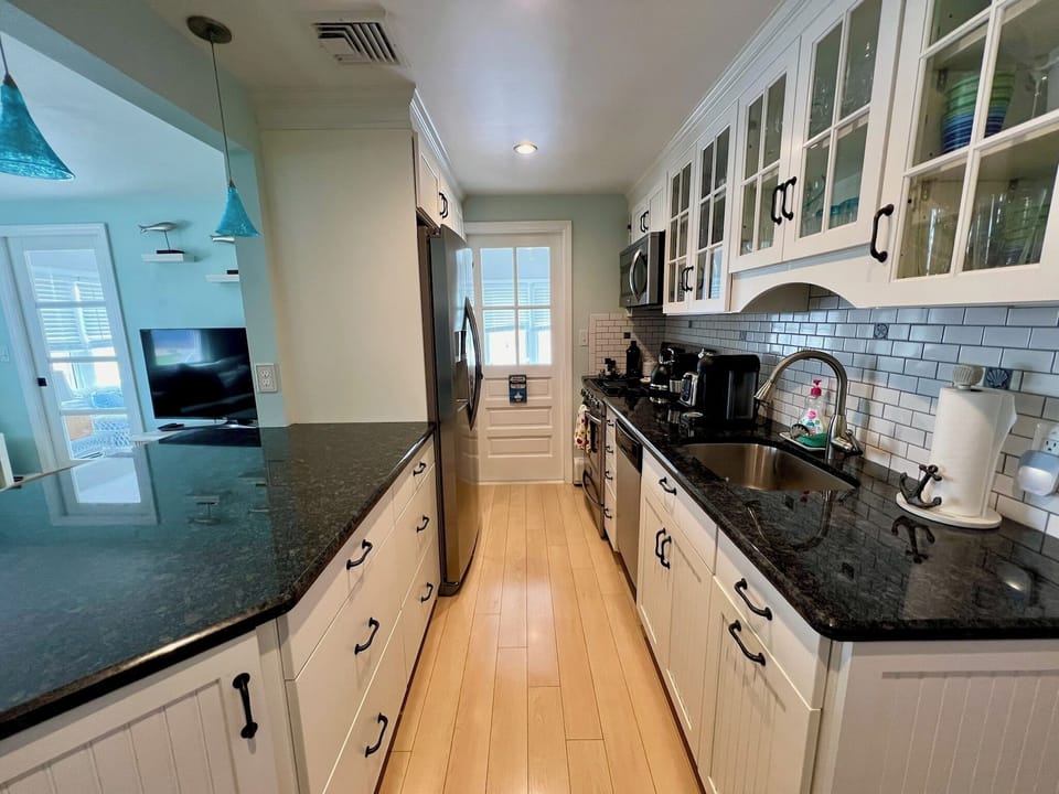 Kitchen and door to Sunroom