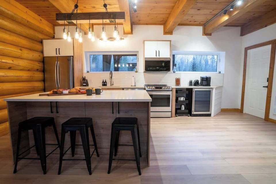 Open concept kitchen with an island.  Perfect for cooking, entertaining and relaxing in good company.